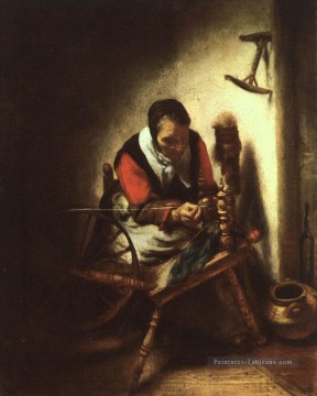  femme Tableau - Une femme Spinning Baroque Nicolaes Maes